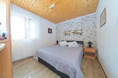 Krevet ili kreveti u jedinici u objektu Apartments with a parking space Postira, Brac - 22159