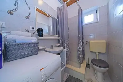 Kupaonica u objektu Apartments with a parking space Postira, Brac - 22159