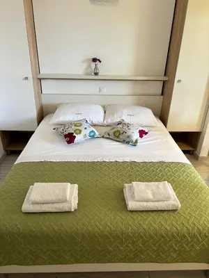 Krevet ili kreveti u jedinici u objektu Apartmani Adria 2