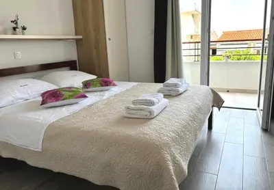 Krevet ili kreveti u jedinici u objektu Apartmani Adria 2