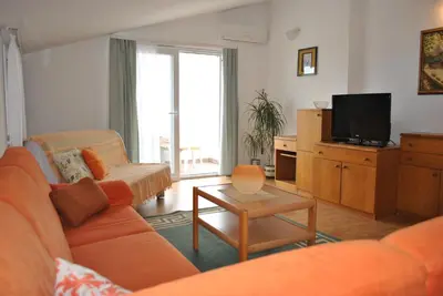 TV i/ili zabavni centar u objektu Apartmani Dalmadino
