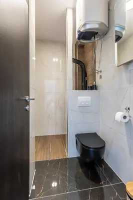 Kupaonica u objektu Villa Sky D 9&1 with tennis court and heated pool