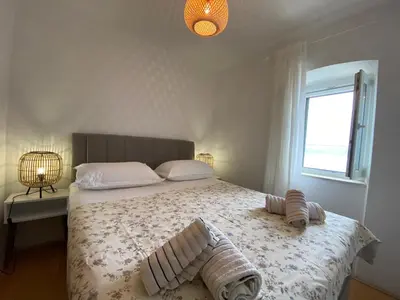 Krevet ili kreveti u jedinici u objektu Holiday home Kuzma with private pool and sea view