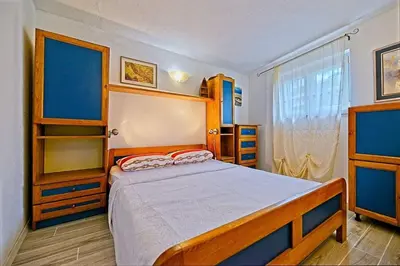Krevet ili kreveti u jedinici u objektu Apartments by the sea Postira, Brac - 22198