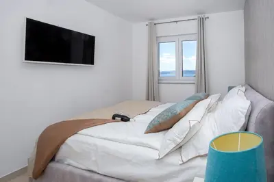 Krevet ili kreveti u jedinici u objektu Apartments with parking space Promajna, Makarska - 22264