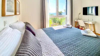 Krevet ili kreveti u jedinici u objektu Nautilus-Bay Apartments - Exklusive Suite in erster Reihe - Suite 320