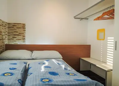 Krevet ili kreveti u jedinici u objektu DugoToploLjeto Apartmani Baska Voda