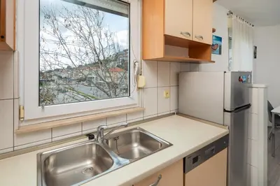 Kuhinja ili čajna kuhinja u objektu West Side Apartment