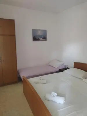 Krevet ili kreveti u jedinici u objektu Robinzon IRENA, apartment by the beach