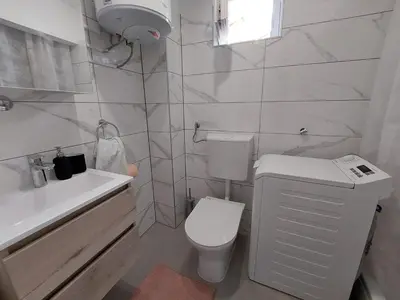 Kupaonica u objektu Apartments Timee first row to beach