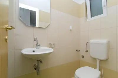 Kupaonica u objektu Holiday home in Omis with terrace, air conditioning, WiFi, washing machine 5202-1