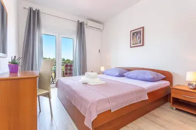 Krevet ili kreveti u jedinici u objektu Apartment Božo