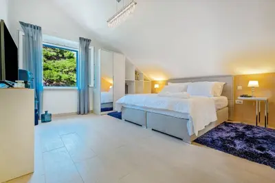 Krevet ili kreveti u jedinici u objektu Villa Joy - 40 m2 heated pool, 35 000 m2 of land