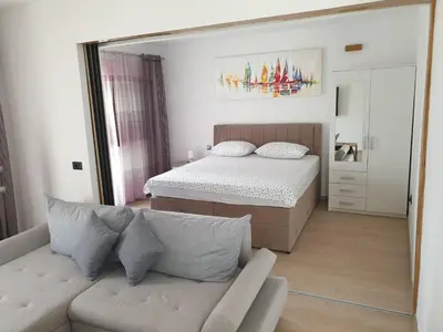 Krevet ili kreveti u jedinici u objektu Apartments by the sea Omis - 21590