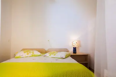 Krevet ili kreveti u jedinici u objektu Beach Holiday Home Laura