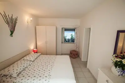 Krevet ili kreveti u jedinici u objektu Beach Holiday Home Laura