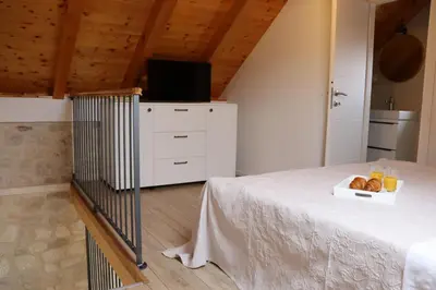Krevet ili kreveti u jedinici u objektu Luxury stone apartment Matijević