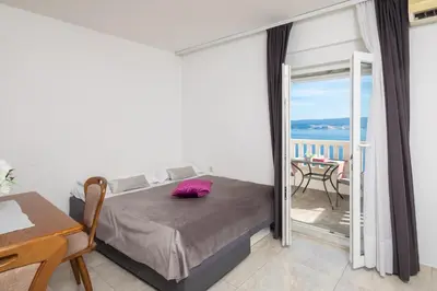 Krevet ili kreveti u jedinici u objektu Seaview Apartment Gogi