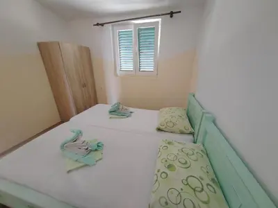 Krevet ili kreveti u jedinici u objektu Apartment Šutalo