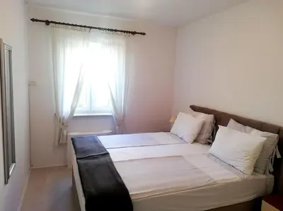 Krevet ili kreveti u jedinici u objektu Apartments Regina