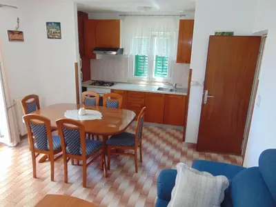 Kuhinja ili čajna kuhinja u objektu Apartments by the sea Postira, Brac - 22206
