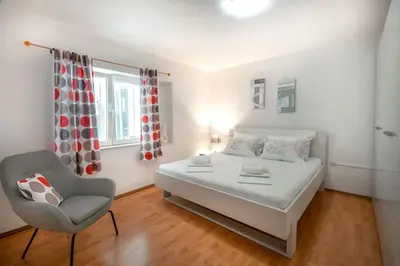 Krevet ili kreveti u jedinici u objektu Apartman Joskić nedaleko plaže