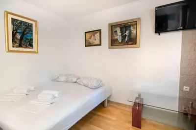 Krevet ili kreveti u jedinici u objektu Apartman Joskić nedaleko plaže