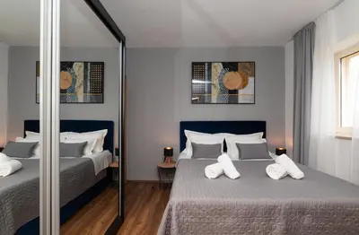 Krevet ili kreveti u jedinici u objektu APARTMENTS4YOU SUPETAR 5 - brand NEW luxury 2-BR - 200 meters from the beach - free parking - beautiful terrace