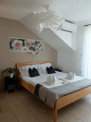 Krevet ili kreveti u jedinici u objektu Agava Apartments
