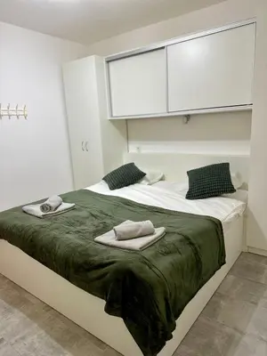 Krevet ili kreveti u jedinici u objektu Apartament Sunny Mimice z widokiem na morze