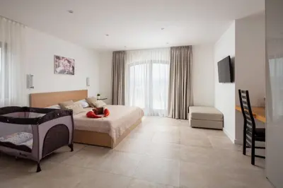 Krevet ili kreveti u jedinici u objektu Villa Clementine with pool, sea view