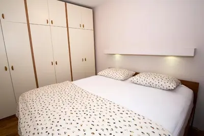 Krevet ili kreveti u jedinici u objektu Cosy apartment near city centar and sea- Marina, Omiš
