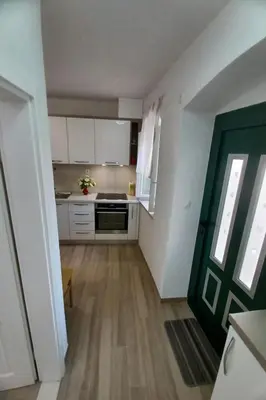 Kuhinja ili čajna kuhinja u objektu Apartments by the sea Povlja, Brac - 22899