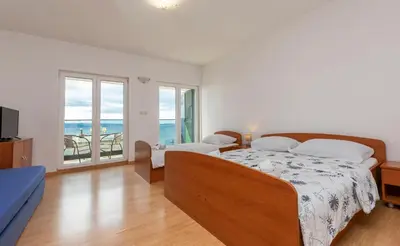 Krevet ili kreveti u jedinici u objektu Apartments Villa Milas with pool