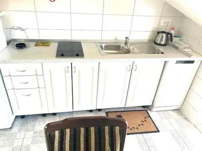 Kuhinja ili čajna kuhinja u objektu Apartments Sanda 2