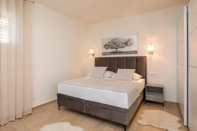 Krevet ili kreveti u jedinici u objektu Beach Apartments Croatia ll