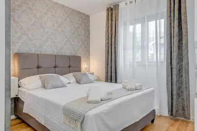 Krevet ili kreveti u jedinici u objektu [BRAND NEW] Apartment Strozanac - near the beach