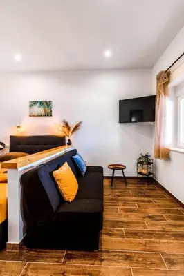 TV i/ili zabavni centar u objektu Seaside apartment