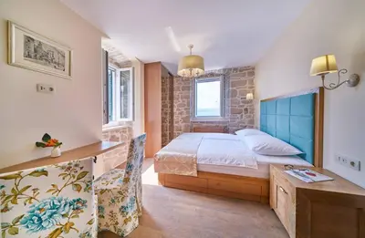 Krevet ili kreveti u jedinici u objektu Exclusive Villa Amara, heated pool - sea view