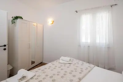 Krevet ili kreveti u jedinici u objektu Caleta Seaview Suites II - Pool & Jacuzzi