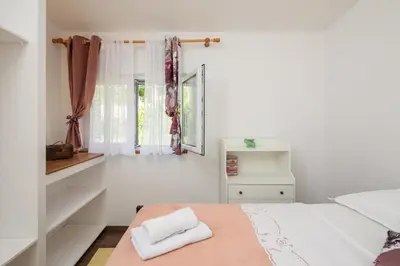 Krevet ili kreveti u jedinici u objektu Beach House Sai
