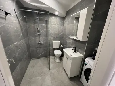 Kupaonica u objektu New Comfort Studio Apartment