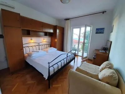 Krevet ili kreveti u jedinici u objektu Apartments by the sea Mimice, Omis - 23074
