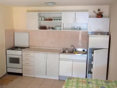 Kuhinja ili čajna kuhinja u objektu Apartments by the sea Mimice, Omis - 23074