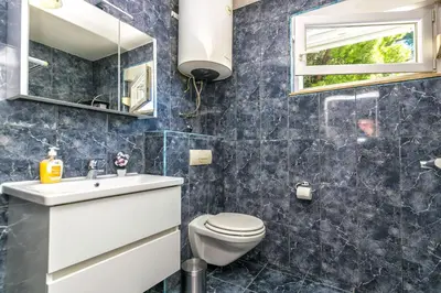 Kupaonica u objektu Apartment Beleca
