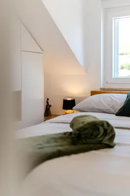 Krevet ili kreveti u jedinici u objektu Apartmani Indigo