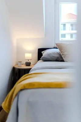 Krevet ili kreveti u jedinici u objektu Apartmani Indigo