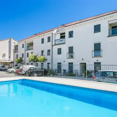 Apartments with a swimming pool Podstrana