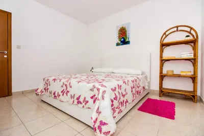 Krevet ili kreveti u jedinici u objektu Apartments Leon
