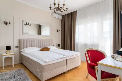 Krevet ili kreveti u jedinici u objektu Storge Boutique Bed & Breakfast